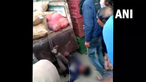A videograb from a ghastly incident in Indore where two teenage boys were thrashed and dragged by a vehicle over suspected theft. (ANI Twitter)