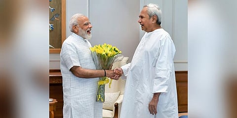 Prime Minister Narendra Modi shakes hands with Odisha Chief Minister Naveen Patnaik. (File | PTI)