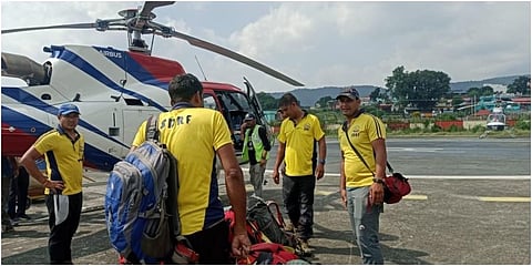 SDRF teams leave from Sahastradhara helipad in Dehradun to rescue the trainees trapped in an avalanche in Draupadi's Danda-2 mountain peak. (Photo |ANI Twitter)