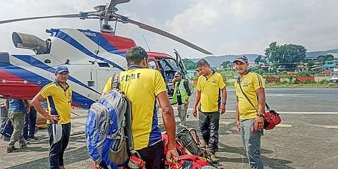 SDRF teams leave from Sahastradhara helipad in Dehradun to rescue the trainees trapped in an avalanche in Draupadi's Danda-2 mountain peak. (Photo |PTI)