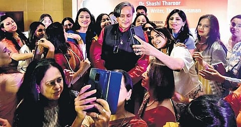 FLO members vie with each other for selfies with Congress presidential candidate Shashi Tharoor on Monday | Jwala