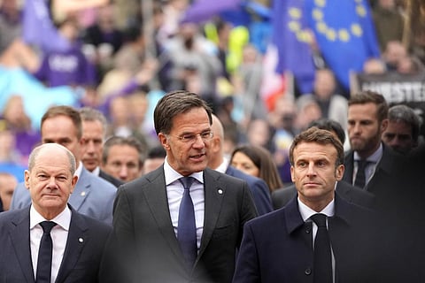 Germany's Chancellor Olaf Scholz, Netherland's Prime Minister Mark Rutte and French President Emmanuel Macron arrive for an EU Summit in Prague. (Photo | AP)