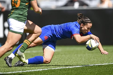 Laure Sansus of France scores a try during the Women's Rugby World Cup pool match between South Africa and France, at Auckland's Eden Park, New Zealand. (Photo | AP)