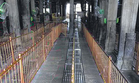 Wall-mount fans fixed at the entrance of Sri Ranganathaswamy temple in Srirangam | M K Ashok Kumar