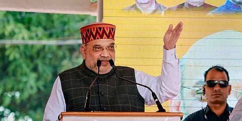 Senior BJP leader Amit Shah addresses a Rally at the Bhattiyat Assembly constituency area in Himachal Pradesh, Nov. 1, 2022. (Photo | PTI)