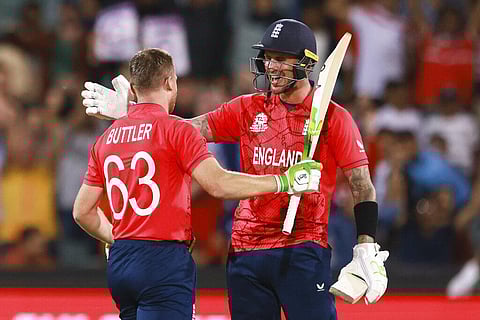 England's Jos Buttler, (L), and Alex Hales celebrate after the T20 World Cup cricket semifinal between England and India in Adelaide. (Photo | AP)