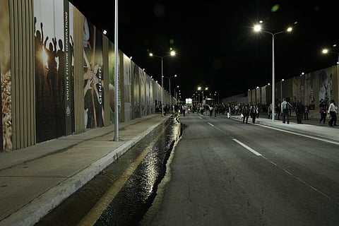 Attendees walk near a sewage leak at the COP27 U.N. Climate Summit, Wednesday, Nov. 9, 2022, in Sharm el-Sheikh, Egypt. (Photo | AP)