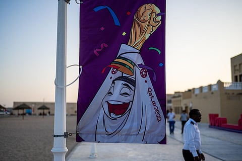 A banner of the Qatar 2022 mascot La'eeb at a beach in Doha, Nov 10, 2022. (File Photo | AFP)