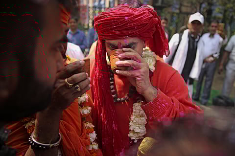 This file image shows a cow urine drinking party hosted by Hindu Mahasabha. (File Photo| AP)