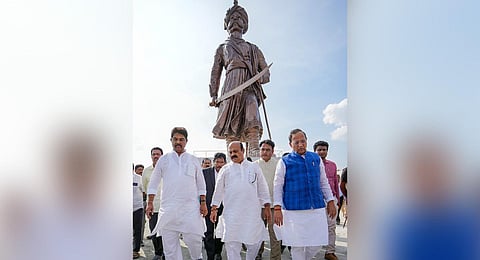 Chief Minister Basavaraj Bommai, BJP senior leader Arun Singh and others visit the 108 feet statue of Nadaprabhu Kempegowda at Kempegowda International Airport in Bengaluru. (Photo | PTI)
