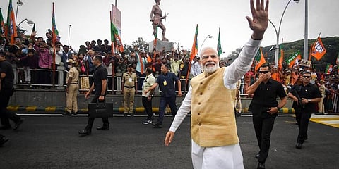 Prime Minister Narendra Modi waves at supporters. (Photo | PTI)