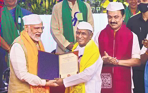 PM Narendra Modi awards a honorary doctorate to music maestro Ilaiyaraaja at the 36th convocation of Gandhigram Rural Institute in Dindigul on Friday as CM M K Stalin looks on | K K SUNDAR