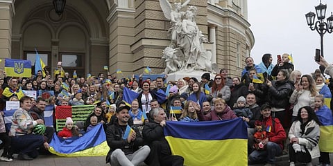 Ukrainians gather in downtown to celebrate the recapturing of Kherson city, Ukraine, Odesa, Saturday, Nov. 12, 2022. (Photo | AP)