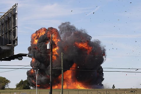 A historic military plane crashes after colliding with another plane during an airshow at Dallas Executive Airport in Dallas. (Photo | AP)