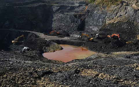 Machineries work at an open pit coal mining site in Tiru valley of Wokha district in Nagaland, Dec. 15, 2021. (File Photo | AP)
