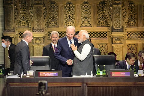 German Chancellor Olaf Scholz, U.S. President Joe Biden, and India's Prime Minister Narendra Modi, chat ahead of a session during the G20 Summit. (Photo | AP)