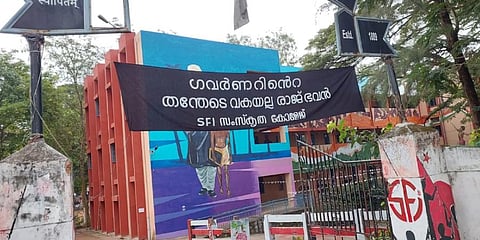A banner put up by SFI at Govt Sanskrit College with objectionable references to Governor Arif Mohammed Khan. The poster was later removed after it became controversial.(Photo | Special arrangement)