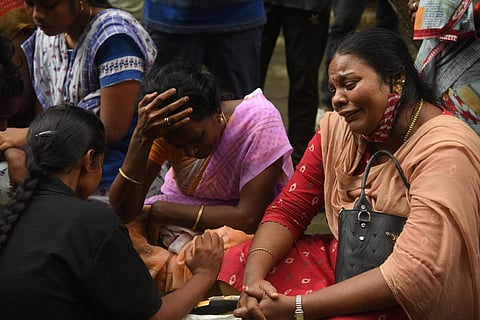 The inconsolable parents of 17-year-old footballer, Priya R, who passed away after a botched surgery, in Rajiv Gandhi general hospital in Chennai. (Photo | R Satish Babu, EPS)