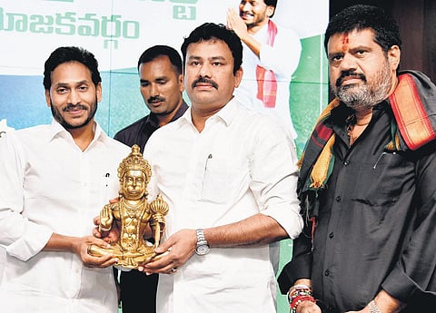 Chief Minister YS Jagan Mohan Reddy being felicitated by YSRC activists of Vizag north Assembly constituency at his camp office in Tadepalli on Tuesday | Express