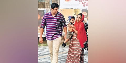 A family at the Sarita-Savita-Sangeeta cinema complex in Kochi | A Sanesh