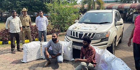 Accused duo Abdul Khader Haris and Rameez alias Raaz seen with 132 kg of ganja and the vehicle.