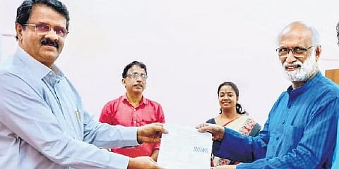 Dr B Ekbal (R) enrolling for the MA Malayalam programme offered by the Sree Narayana Guru Open University | Express