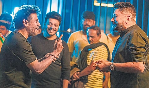 Shivarajkumar, director Srini and Jayaram on the sets of Ghost