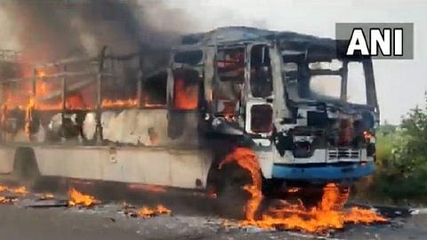 A Maharashtra State transport bus which caught fire. (Photo | ANI Twitter)