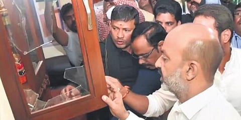 BJP State president Bandi Sanjay checks the damage caused by attackers at party MP Arvind’s house in Hyderabad on Saturday