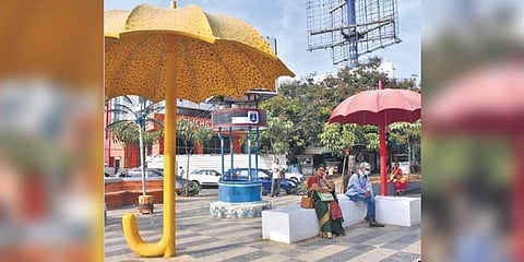  Citizens take a break by utilising the urban seation concept at the traffic islands at the busy Cyber Towers and Shilparamam junctions in Hyderabad on Saturday | Jwala 