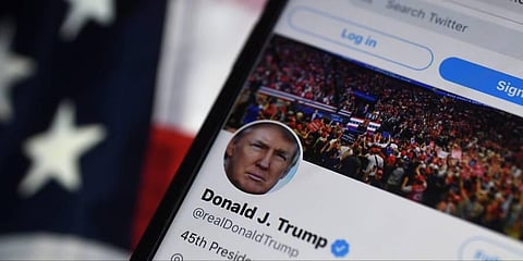 The Twitter account of US President Donald Trump is displayed on a mobile phone. (Photo | AFP)