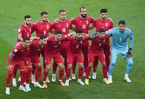 Iranian players pose ahead of the World Cup group B soccer match between England and Iran at the Khalifa International Stadium in Doha, Nov. 21, 2022. (Photo | AP)