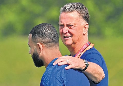 Dutch coach Louis Van Gaal talks with Memphis Depay. (Photo | AFP)
