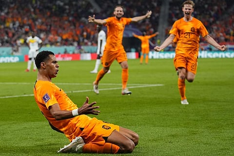 Cody Gakpo of the Netherlands celebrates scoring the opening goal during the World Cup, group A soccer match between Senegal at the Al Thumama Stadium in Doha, Nov. 21, 2022. (Photo | AP)