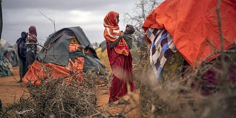 A Somali woman breastfeeds her child at a camp for displaced people on the outskirts of Dollow, Somalia. (Photo | AP)