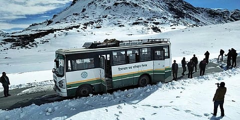 A Himachal Pradesh roadways bus amidst the snow clad mountains at Rohtang Pass, in Himachal Pradesh. (File Photo | PTI)