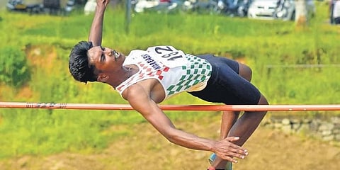 Blesson Nayak of Mar Basil HSS, Kothamangalam, stood first in the senior boys high jump at the Ernakulam Revenue District School Sports Meet on Monday. (Photo | A Sanesh, EPS)
