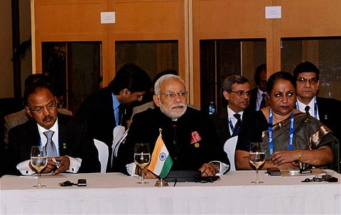 Prime Minister Narendra Modi at an informal BRICS meeting ahead of the G 20 Summit in Brisbane Australia. (File photo | PTI)