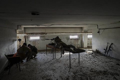 A sniper unit aims towards Russian positions during an operation, Kherson region, southern Ukraine, Nov. 19, 2022. (Photo | AP)
