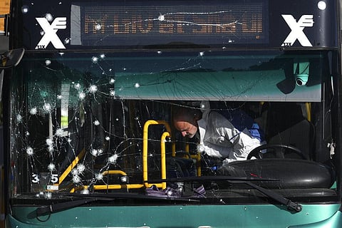 Israeli police inspect the scene of an explosion at a bus stop in Jerusalem, Wednesday, Nov. 23, 2022. (Photo | AP)