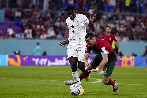 Ghana's Mohammed Salisu fouls in the penalty box Portugal's Cristiano Ronaldo during a World Cup group H soccer match at the Stadium 974 in Doha, Qatar, Thursday, Nov. 24, 2022. (Photo | AP)