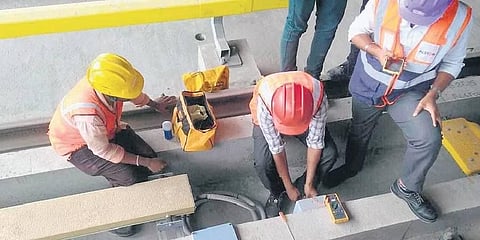 Static tests being conducted along the tracks between Whitefield and Garudacharpalya metro stations