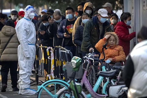 Uncertainty of a lockdown in at least some Beijing districts have fuelled the demand for food and other supplies.(Photo | AP)