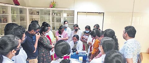 Students inside the mycology lab of AIIMS Bhubaneswar | Express