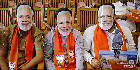BJP workers wear mask of Prime Minister Narendra Modi in Gandhinagar. Photo used for representational purpose only.