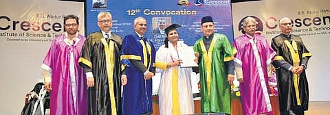 A student receives her degree from V-C Dr A Peer Mohammed, Pro-Chancellor Abdul Qadir A Rahman Buhari and MoES Secretary M Ravichandran | Express
