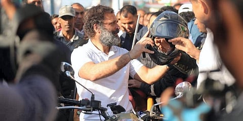 Congress leader Rahul Gandhi rides a bike during the Bharat Jodo Yatra in Madhya Pradesh. (Photo |PTI)