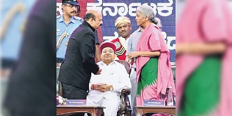 CM Basavaraj Bommai interacts with Union Finance Minister Nirmala Sitharaman in the presence of Governor Thaawarchand Gehlot at the Global Investors Meet 2022, in Bengaluru on Wednesday | Shashidhar