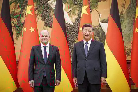 German Chancellor Olaf Scholz, (L), poses for a photo with Chinese President Xi Jinping at the Great Hall of People in Beijing, Nov. 4, 2022. (Photo | AP)