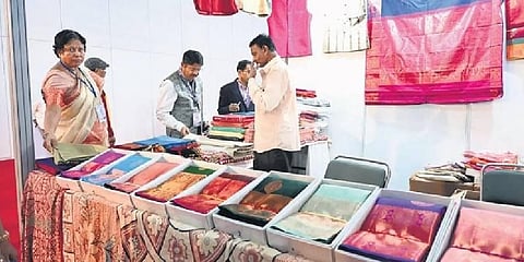 People check out a stall at Global Investors Meet 2022 at the Bengaluru Palace Grounds on Friday | Nagaraja Gadekal